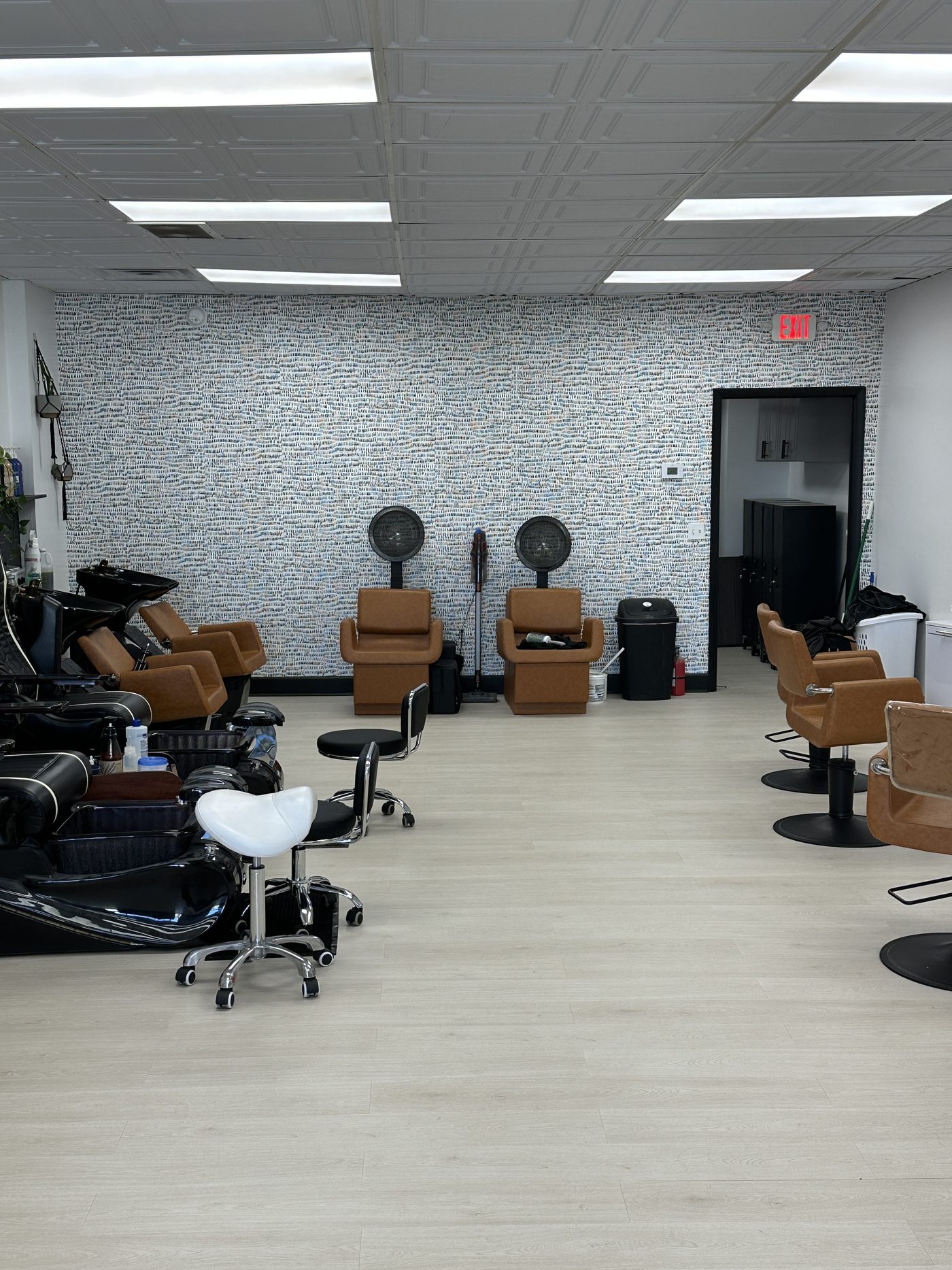 The Lounge Salon interior — styling chairs and wash stations